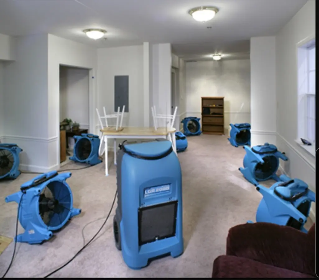 Air movers and dehumidifier setup for Water Damage Restoration in Hazle